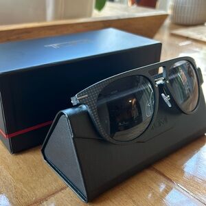 Polarized Tumi black gradient, sunglasses new with tags and box